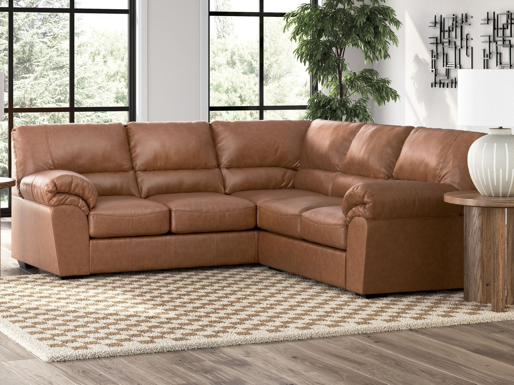 Umber-hued faux leather WillowBend sectional sofa.