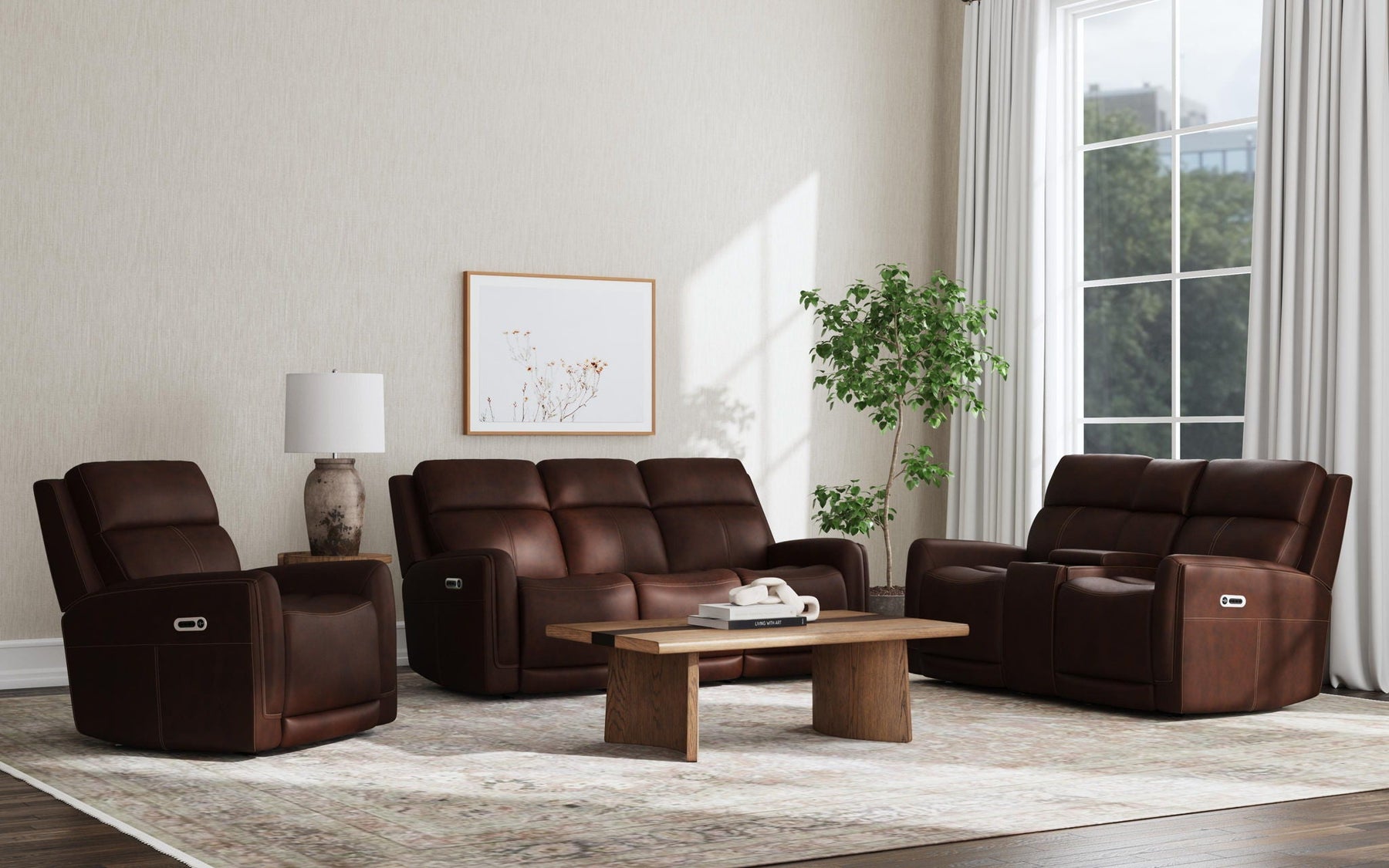 Modern living room featuring brown leather recliner sofas and armchairs arranged around a wooden coffee table, showcasing the latest furniture trend in comfort and contemporary home design.